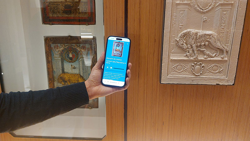 Schermata DIDA con scheda contenuto e controlli di ascolto/lettura